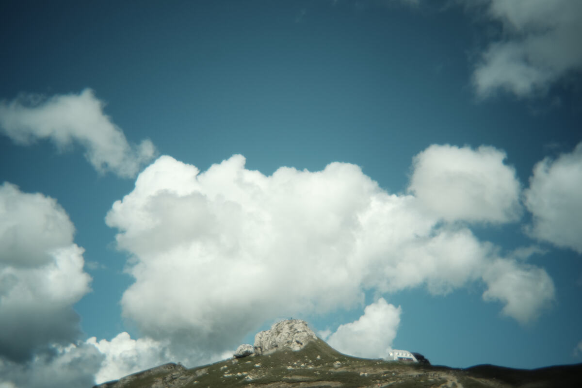 A large cloud over the mountains in Romania
